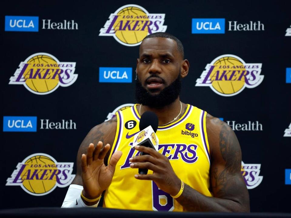 LeBron James asked media this week why he wasn't being asked questions about a controversial photo featuring NFL owner Jerry Jones. (Ronald Martinez/Getty Images - image credit)