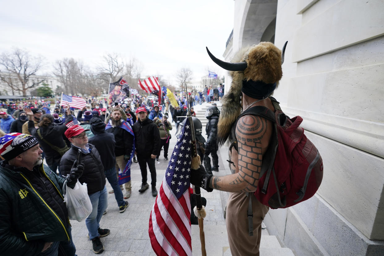 Trump supporters gather outside the Capitol, Wednesday, Jan. 6, 2021, in Washington. As Congress prepares to affirm President-elect Joe Biden&#39;s victory, thousands of people have gathered to show their support for President Donald Trump and his claims of election fraud. (AP Photo/Manuel Balce Ceneta)