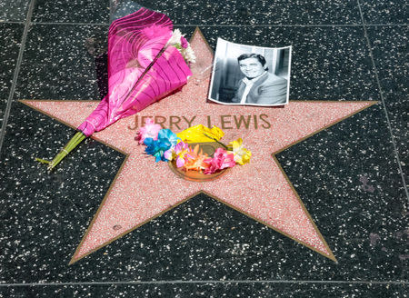 A makeshift memorial appears for late comedian, actor and legendary entertainer Jerry Lewis around his star on the Hollywood Walk of Fame in Los Angeles, California, U.S. August 20, 2017. REUTERS/Kyle Grillot