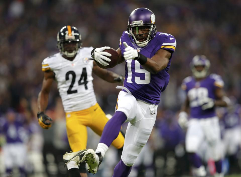 Minnesota Vikings wide receiver Jennings runs for a first quarter touchdown as Pittsburgh Steelers cornerback Taylor pursues during their NFL football game at Wembley Stadium in London