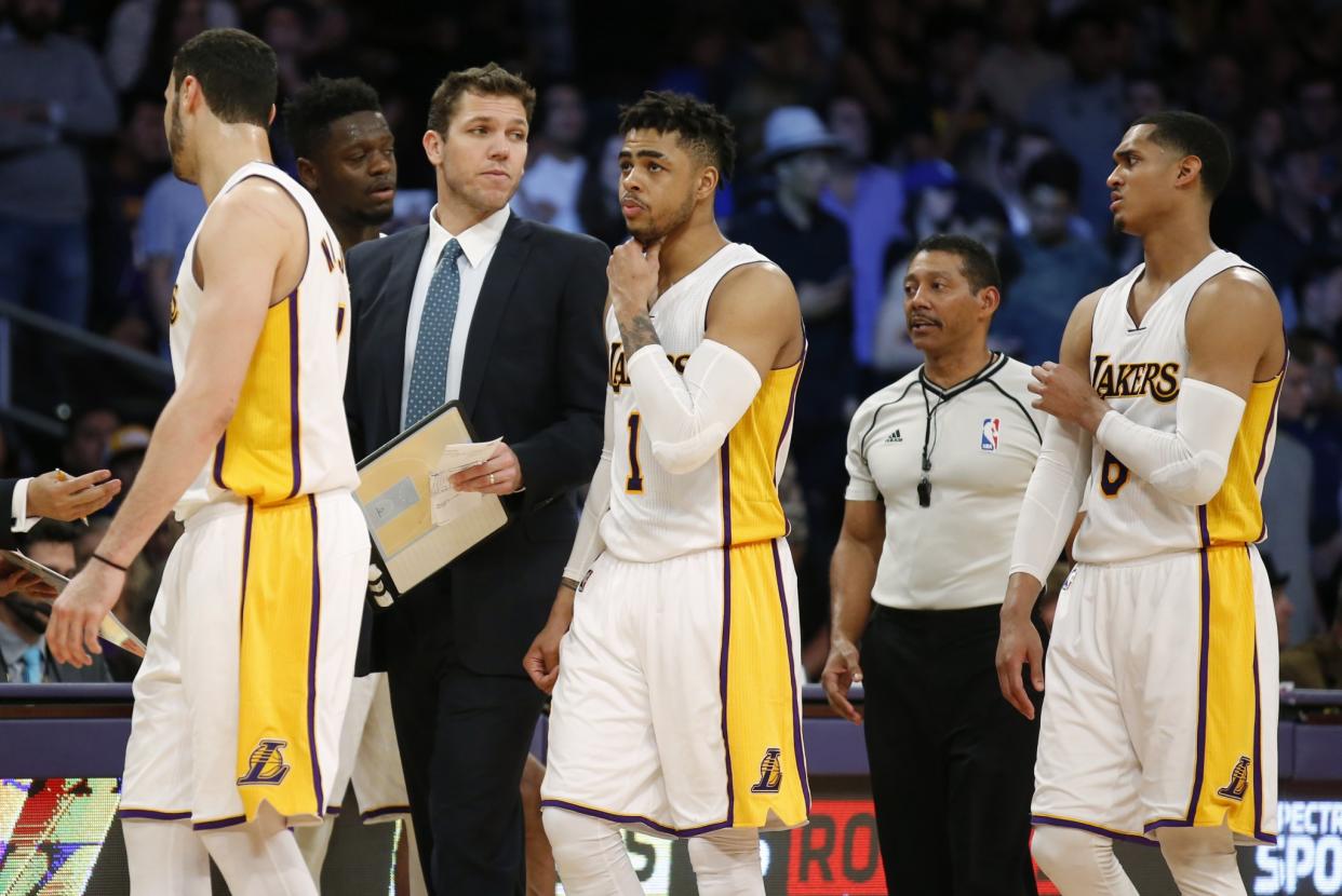 The Lakers have a young coach in Luke Walton and young players such as, from left, Larry Nance Jr., D’Angelo Russell and Jordan Clarkson. (AP)