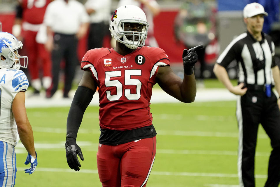 FILE - Arizona Cardinals linebacker Chandler Jones (55) gestures during the first half of an NFL football game against the Detroit Lions in Glendale, Ariz., in this Sunday, Sept. 27, 2020, file photo. Chandler Jones was present at the first day of Arizona Cardinals training camp on Tuesday morning, July 27, 2021. Larry Fitzgerald was not. Both developments were expected as the Cardinals officially opened their preseason at State Farm Stadium. (AP Photo/Rick Scuteri, File)