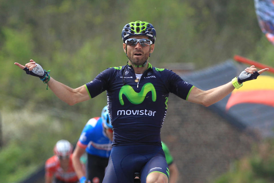 Spain's Alejandro Valverde of the Movistar team celebrates as he wins the Belgian cycling classic Walloon Arrow/Fleche Wallonne, in Huy, Belgium, Wednesday, April 23, 2014. Ireland's Daniel Martin of the Garmin team came second, Poland's Michal Kwiatkowski of the Omega Pharma team was third. (AP Photo/Yves Logghe)