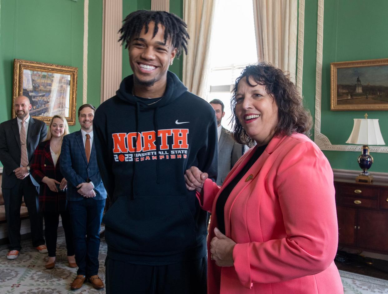 Former North High boys' basketball player Carl-Hens Beliard shown last spring meeting with Lt. Gov. Kim Driscoll during the Polar Bears' visit to the Massachusetts Statehouse. Beliard passed away in November.