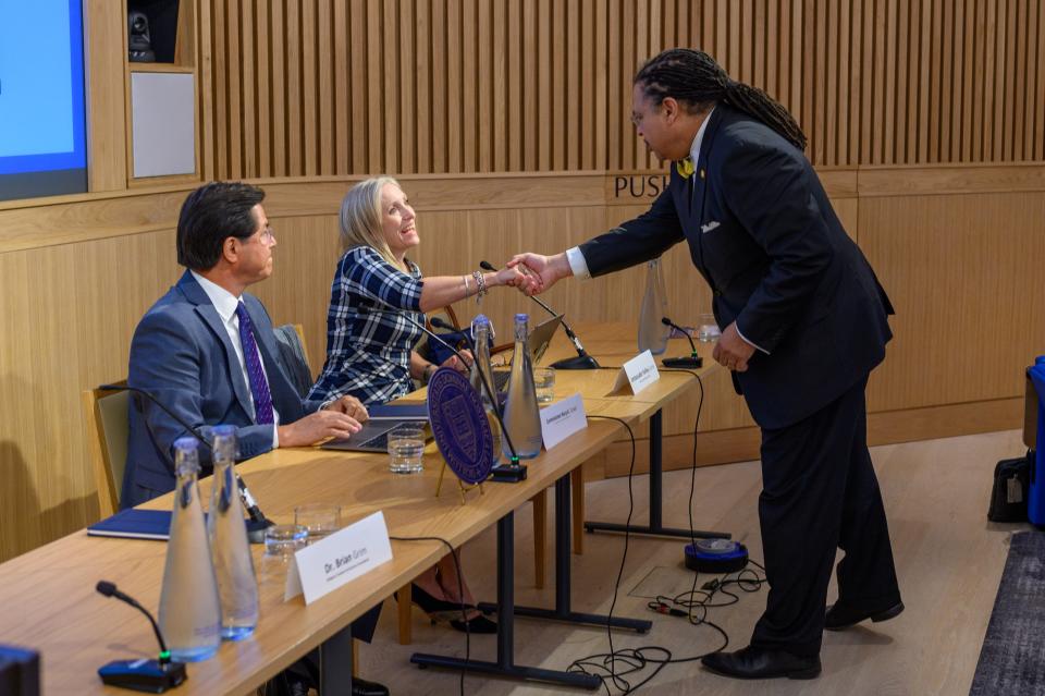 Notre Dame Law School Dean Marcus Cole greets former U.S. ambassador-at-large for women’s issues Kelley Currie at the Notre Dame Law School 2023 Religious Liberty Summit in London. | Matt Cashore, University of Notre Dame