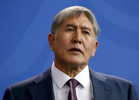 Kyrgyzstan's President Almazbek Atambayev addresses a news conference following a meeting with German Chancellor Angela Merkel at the Chancellery in Berlin, April 1, 2015. REUTERS/Fabrizio Bensch