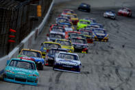 DOVER, DE - JUNE 03: Jimmie Johnson, driver of the #48 Lowe's Madagascar Chevrolet, leads a group of cars during the NASCAR Sprint Cup Series FedEx 400 benefiting Autism Speaks at Dover International Speedway on June 3, 2012 in Dover, Delaware. (Photo by Patrick Smith/Getty Images for NASCAR)