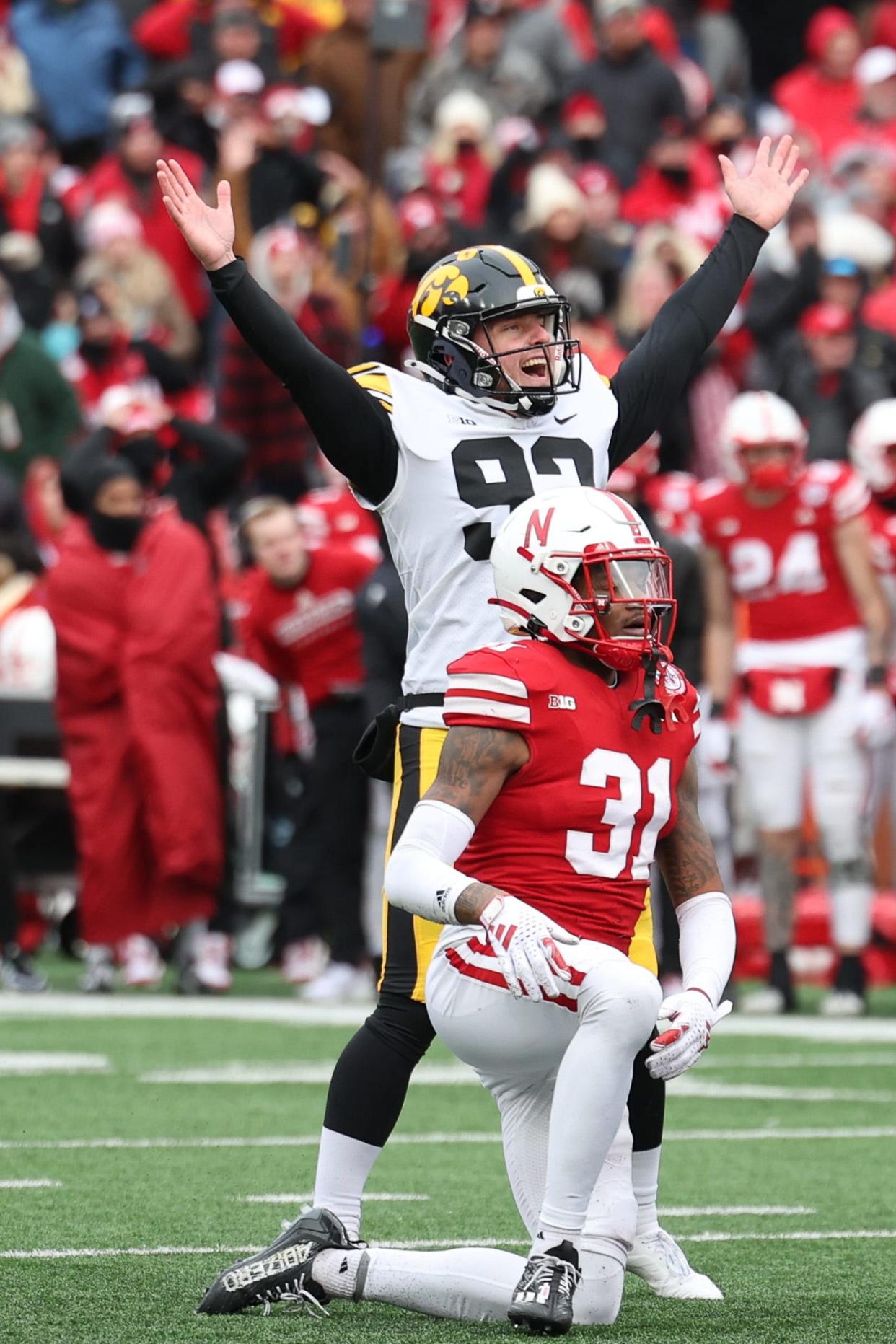 Iowa Hawkeyes kicker Marshall Meeder celebrates after kicking the game-winning field goal against the Nebraska Cornhuskers Friday at Memorial Stadium. The Hawkeyes won the Big Ten West.