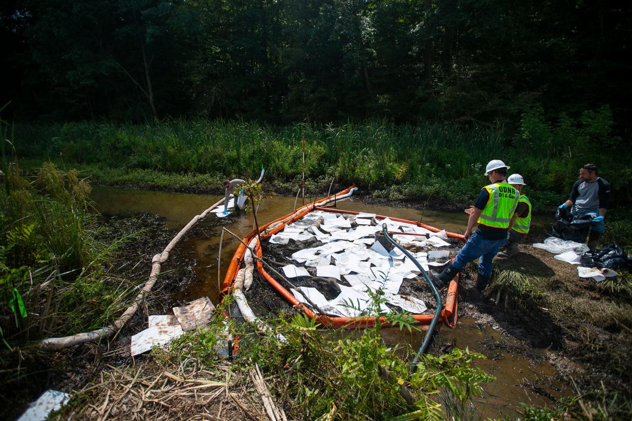 Archive photo.  August 23, 2021: Ohio Department of Nature Resources used a special towel like material that is designed to soak up oil but not water, as they work to contain and plug a crude oil spill at Veto Lake. It was likely from an old orphaned well in Washington County.