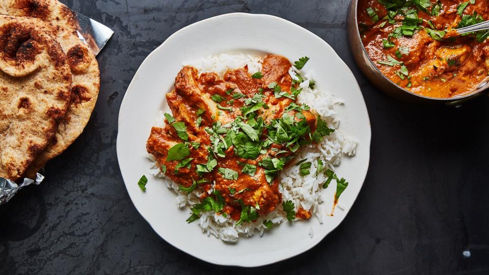 Serve this butter chicken with a side of roti.