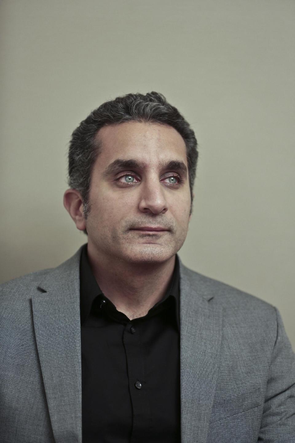 Egyptian satirist Bassem Youssef poses for a photograph at his studio in downtown Cairo, Egypt, Wednesday, Jan. 8, 2014. Youssef, often compared to U.S. comedian Jon Stewart, says his team will bring back its popular television show poking fun at politics in a country still beset by turmoil following a July military coup. However, he acknowledged the challenges facing him and others in Egypt now in an interview with The Associated Press. (AP Photo / Nariman El-Mofty)