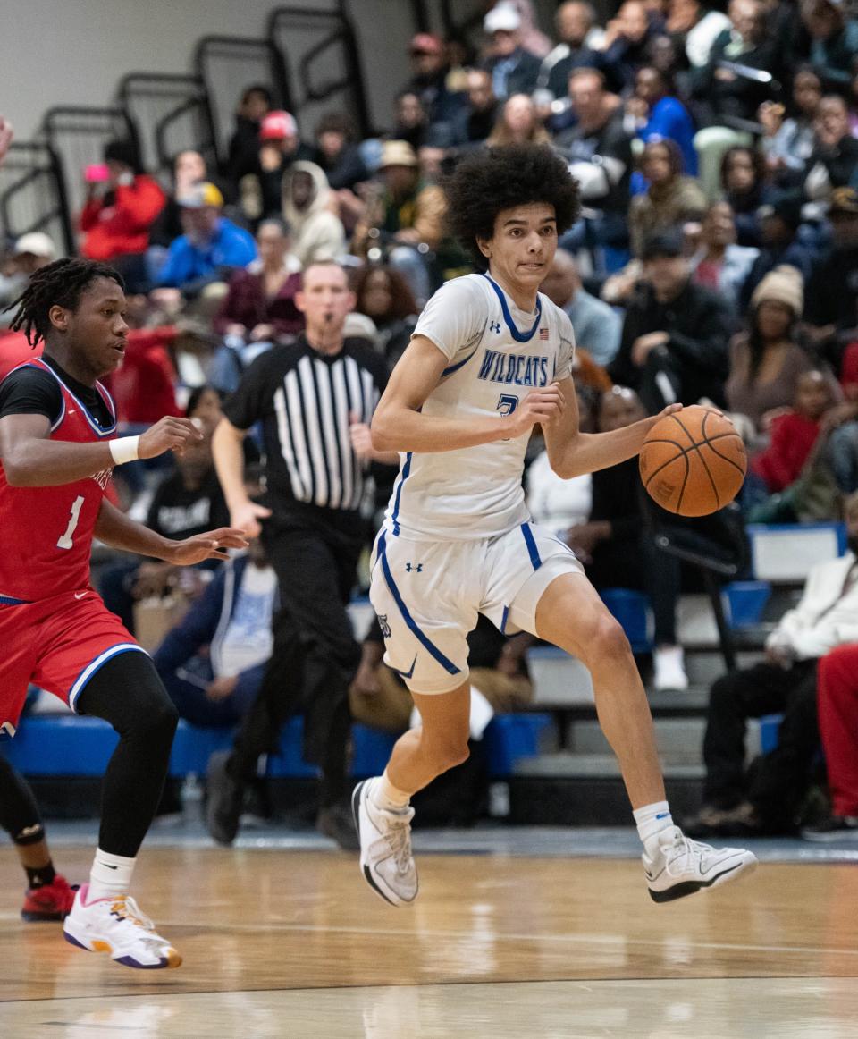 Alex Jasquith (3) brings the ball up court during the Pine Forest vs Washington boys basketball game at Booker T. Washington High School in Pensacola on Friday, Jan. 19, 2024.