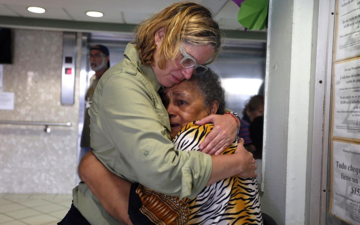 Mayor Carmen Yulin Cruz hugs a woman during her visit to an elderly home - EFE