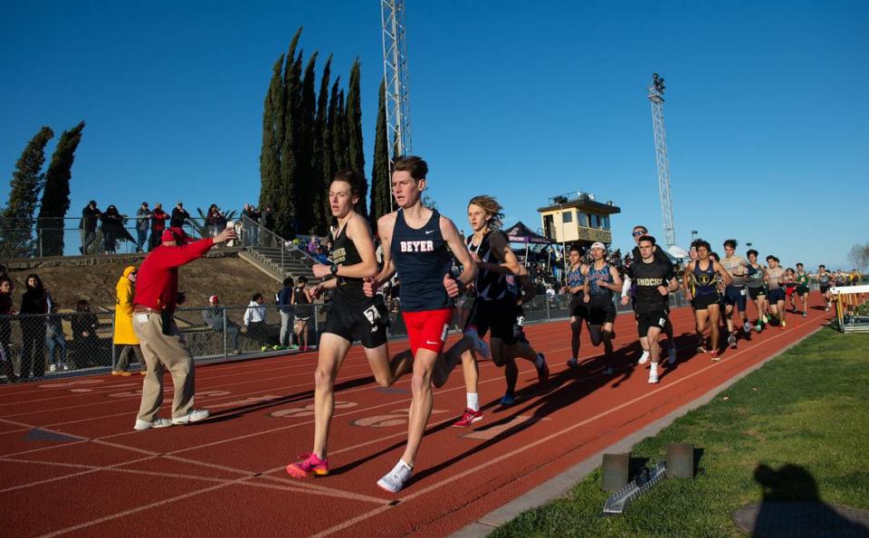 Boys 1600 meter runners start the second lap during the Stanislaus County track meet at Hughson High School in Hughson, Calif., Friday, March 24, 2023.