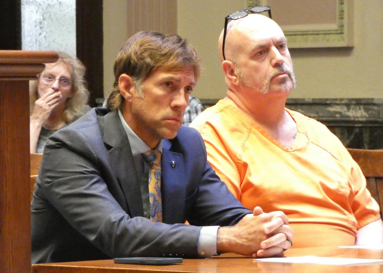 Anthony Morgan, right, pleaded guilty to a charge of reckless homicide on Wednesda, in Crawford County Common Pleas Court. His attorney, James Mayer III or Mansfield, is at left.