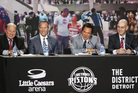 Nov 22, 2016; Detroit, MI, USA; (Left to right) Detroit mayor Mike Duggan and Christopher Ilitch and Detroit Pistons owner Tom Gores and NBA commissioner Adam Silver smile during a press conference at Cass Tech High School. Mandatory Credit: Raj Mehta-USA TODAY Sports