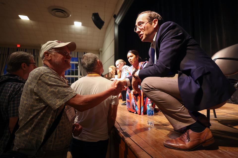 Deseret News editor Hal Boyd, right, shakes hands with David Rine after speaking on a panel called “Can Media Go From the Problem to the Solution?” at the Braver Angels National Convention at Gettysburg College in Gettysburg on Friday, July 7, 2023. | Kristin Murphy, Deseret News