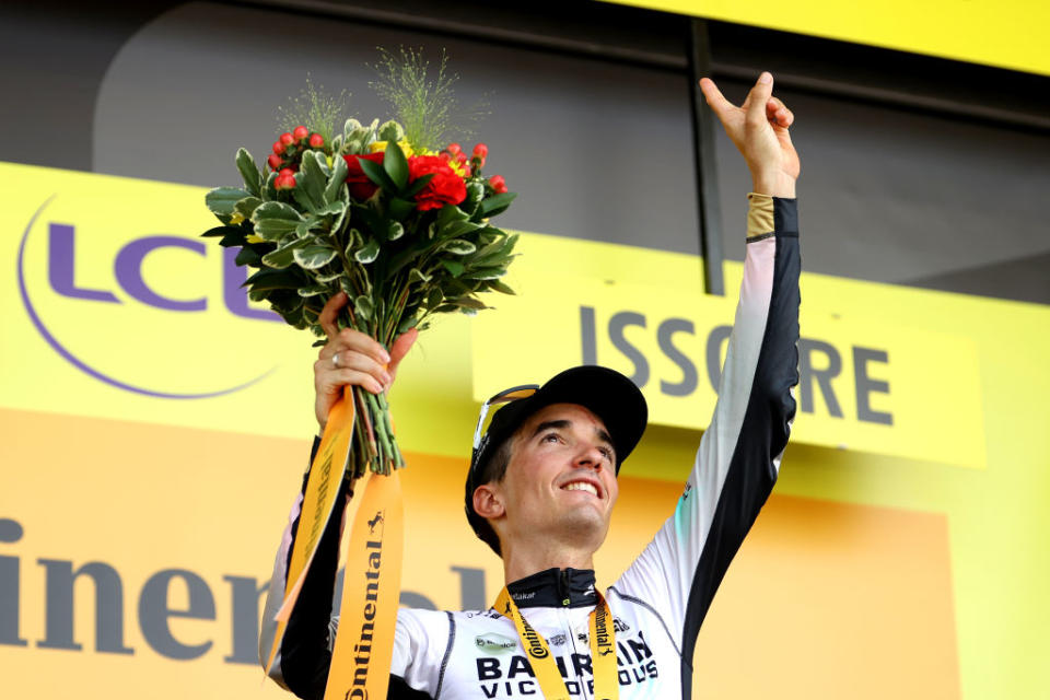 ISSOIRE FRANCE  JULY 11 Pello Bilbao of Spain and Team Bahrain Victorious celebrates at podium as stage winner and dedicates the victory to his teammate Gino Mder of Switzerland during the stage ten of the 110th Tour de France 2023 a 1672km stage from Vulcania to Issoire  UCIWT  on July 11 2023 in Issoire France Photo by Michael SteeleGetty Images