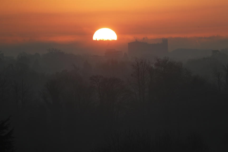 'The sun rises as NATO leaders arrive for a meeting at The Grove hotel and resort in Watford, Hertfordshire, England, Wednesday, Dec. 4, 2019. As NATO leaders meet and show that the world's biggest security alliance is adapting to modern threats, NATO Secretary-General Jens Stoltenberg is refusing to concede that the future of the 29-member alliance is under a cloud. (AP Photo/Frank Augstein)