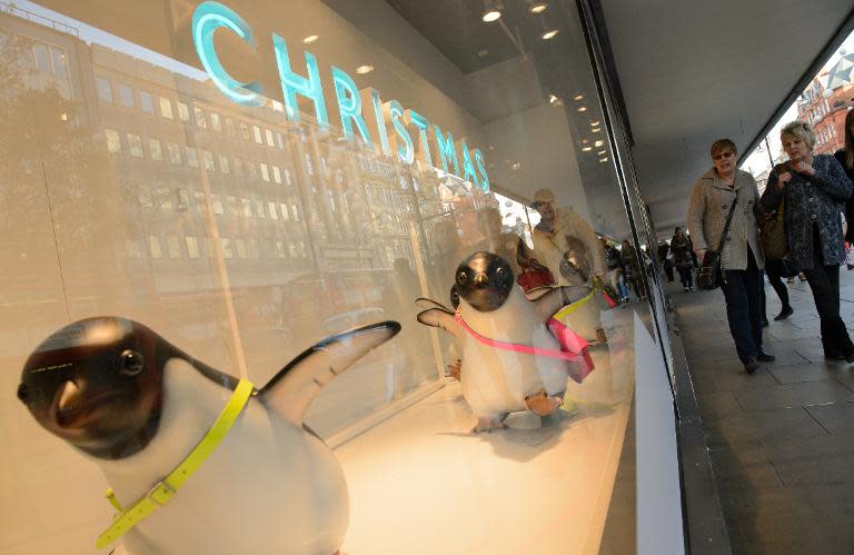 Penguins from the "Monty the Penguin" advert are seen in the window display at the John Lewis department store in London on November 24, 2014