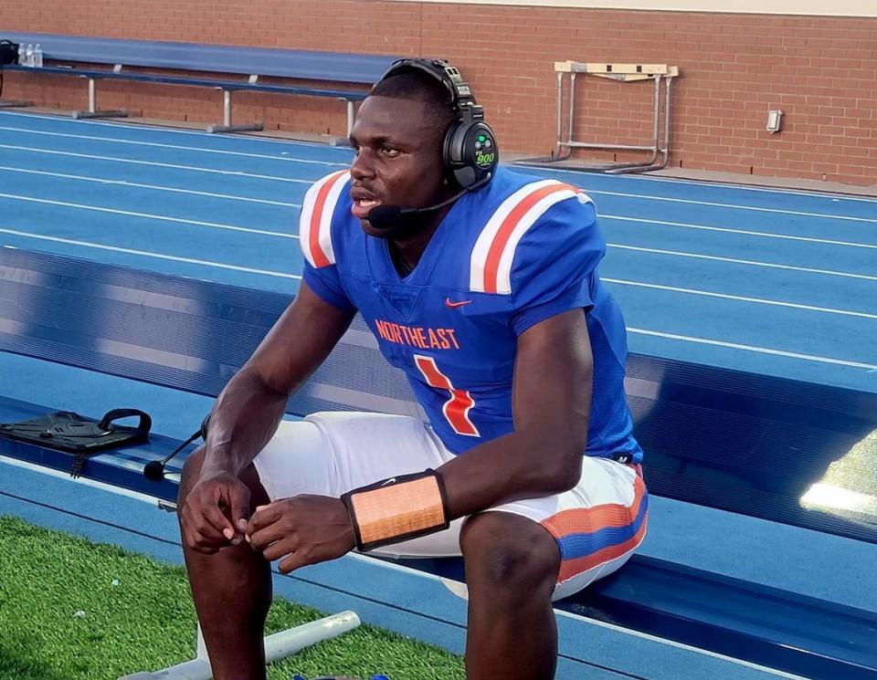 Richland Northeast quarterback and North Carolina State commit Will Wilson sits on the bench during a game against Keenan on Aug. 31, 2023.