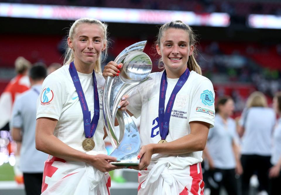 England’s Chloe Kelly (left) and Ella Toone celebrate with the trophy after England win the Euro 2022 final at Wembley (Nigel French/PA) (PA Wire)