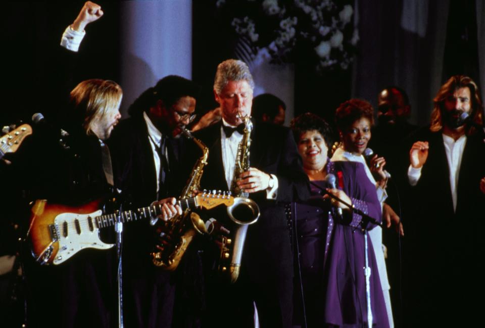 President Bill Clinton plays the saxophone at the Arkansas Inauguration Ball on the day of his inauguration as 42nd President of the United States on January 20, 1993. (Photo by Steve Novak/Consolidated News Pictures/Getty Images)