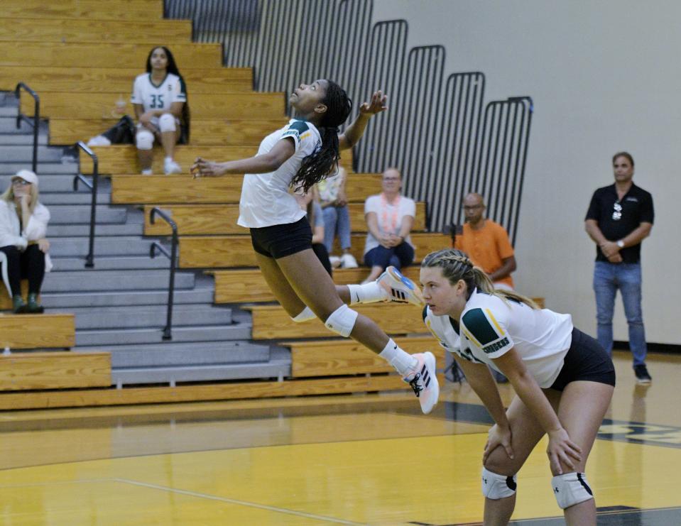 Suncoast junior McKayla Theleus rises for a shot in the third game of the Chargers' sweep of Wellington on Sept. 14, 2022.