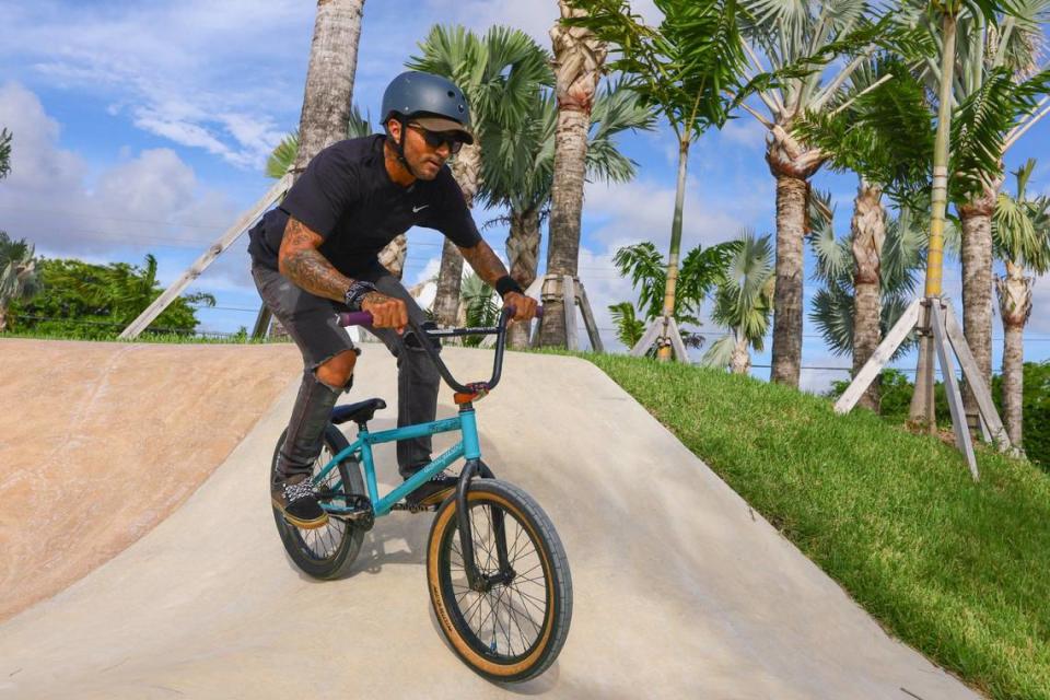 Tico, 60, a retired BMX racer, rides on the pump track of the newly inaugurated eastern portion of Doral Central Park at 3005 NW 92nd Ave. in Doral, Florida, on Monday, Aug. 26, 2024.