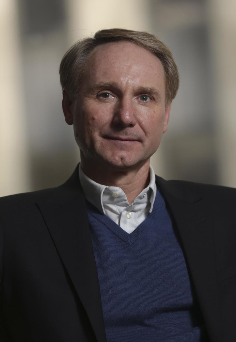 In this Monday, May 13, 2013 photo, author Dan Brown poses for a portrait in New York. His new book, "Inferno," published by Doubleday releases on May 14, 2013. (AP Photo/Seth Wenig)