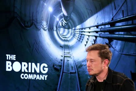 FILE PHOTO: Elon Musk arrives to speak at Boring Company community meeting in Bel Air, Los Angeles, California, U.S. May 17, 2018. REUTERS/Lucy Nicholson/File Photo