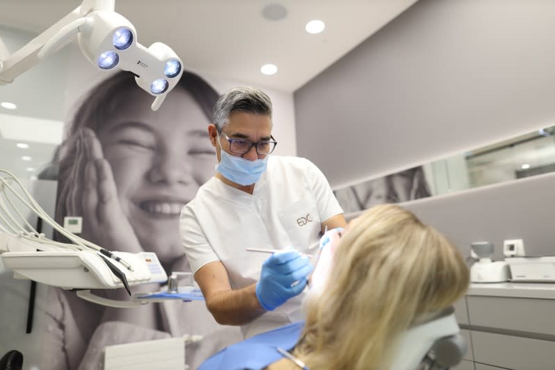 Dentist Daniel Baketic is seen working at his dental clinic EDC in Zagreb