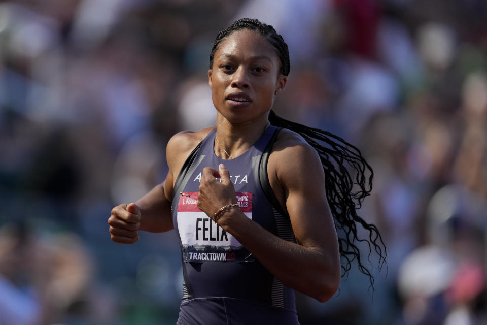 Allyson Felix finishes second during a semi-final in the women's 200-meter run at the U.S. Olympic Track and Field Trials Friday, June 25, 2021, in Eugene, Ore. (AP Photo/Ashley Landis)