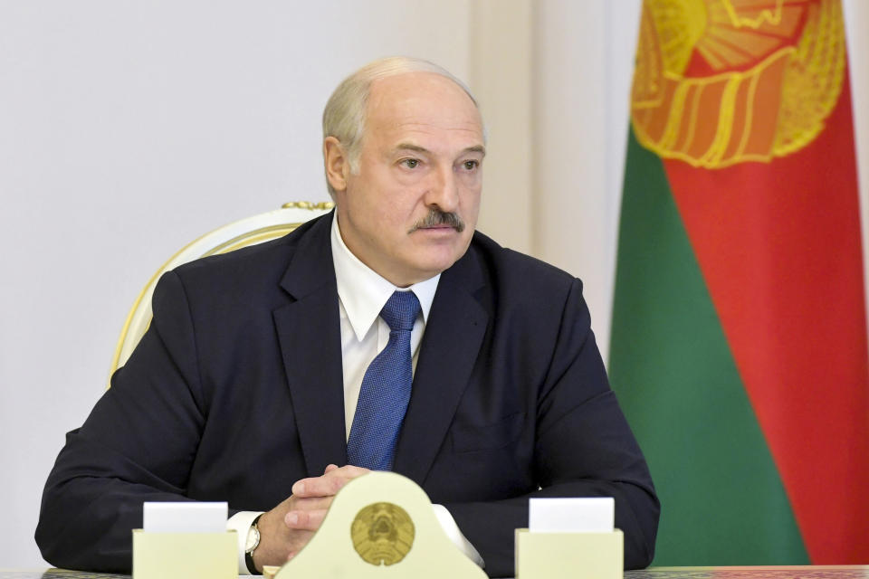 Belarusian President Alexander Lukashenko chairs a Security Council meeting in Minsk, Belarus, Tuesday, Aug. 18, 2020. The widening strikes come on the 10th straight day of unprecedented mass protests against election results that handed President Alexander Lukashenko his sixth term with 80% of the vote. (Andrei Stasevich/Pool Photo via AP)