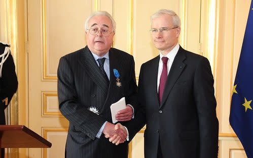 John Rogister, left, in 2012 after being appointed Grand officier de l’ordre national du mérite