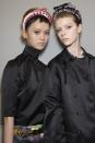 <p>Headbands that would make Blair Waldorf seethe with jealousy backstage at Prada's spring show. </p>