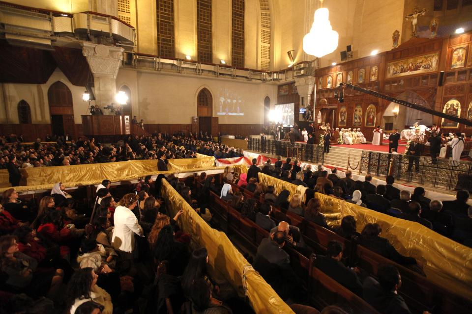 Coptic Christians attend a Coptic Christmas eve mass led by Pope Tawadros II in Cairo