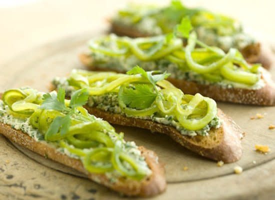 These crostini are spread with herbed goat cheese and topped with grilled hatch chiles, cut into rings. Anaheim chiles would also work well. Don't worry about the peppers being too hot to handle -- grilling will tone down their bite.    Get the Recipe for <a href="http://www.huffingtonpost.com/2011/10/27/crostini-with-roasted-hat_n_1056744.html" target="_hplink">Crostini with Roasted Hatch Chiles and Goat Cheese</a>      
