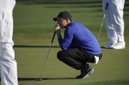 Rory McIlroy of Northern Ireland prepares to putt on the second green during Tuesday practice rounds for the 2017 Masters at Augusta National Golf Course in Augusta, Georgia, U.S., April 4, 2017. REUTERS/Mike Segar