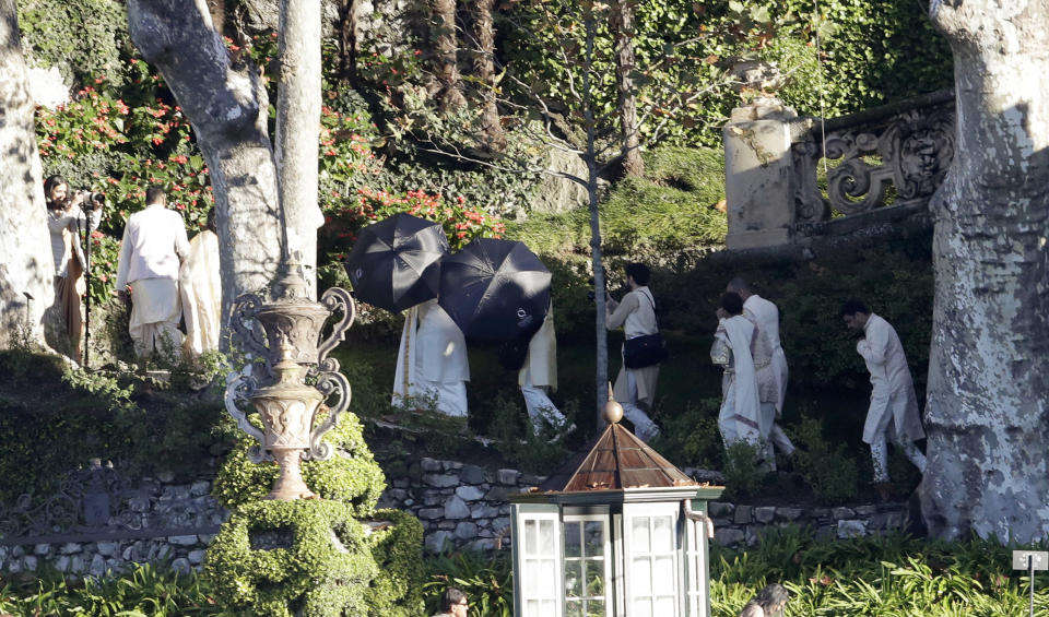 Guests arrive to attend the wedding of Indian Bollywood stars Deepika Padukone and Ranveer Singh at the Villa Balbianello in Lenno, Como lake, northern Italy, Wednesday, Nov. 14, 2018. Wednesday’s nuptials at Villa Balbianello, a lakeside mansion featured in Star Wars and James Bond films, came on the fifth anniversary of the release of their first movie together. (AP Photo/Luca Bruno)