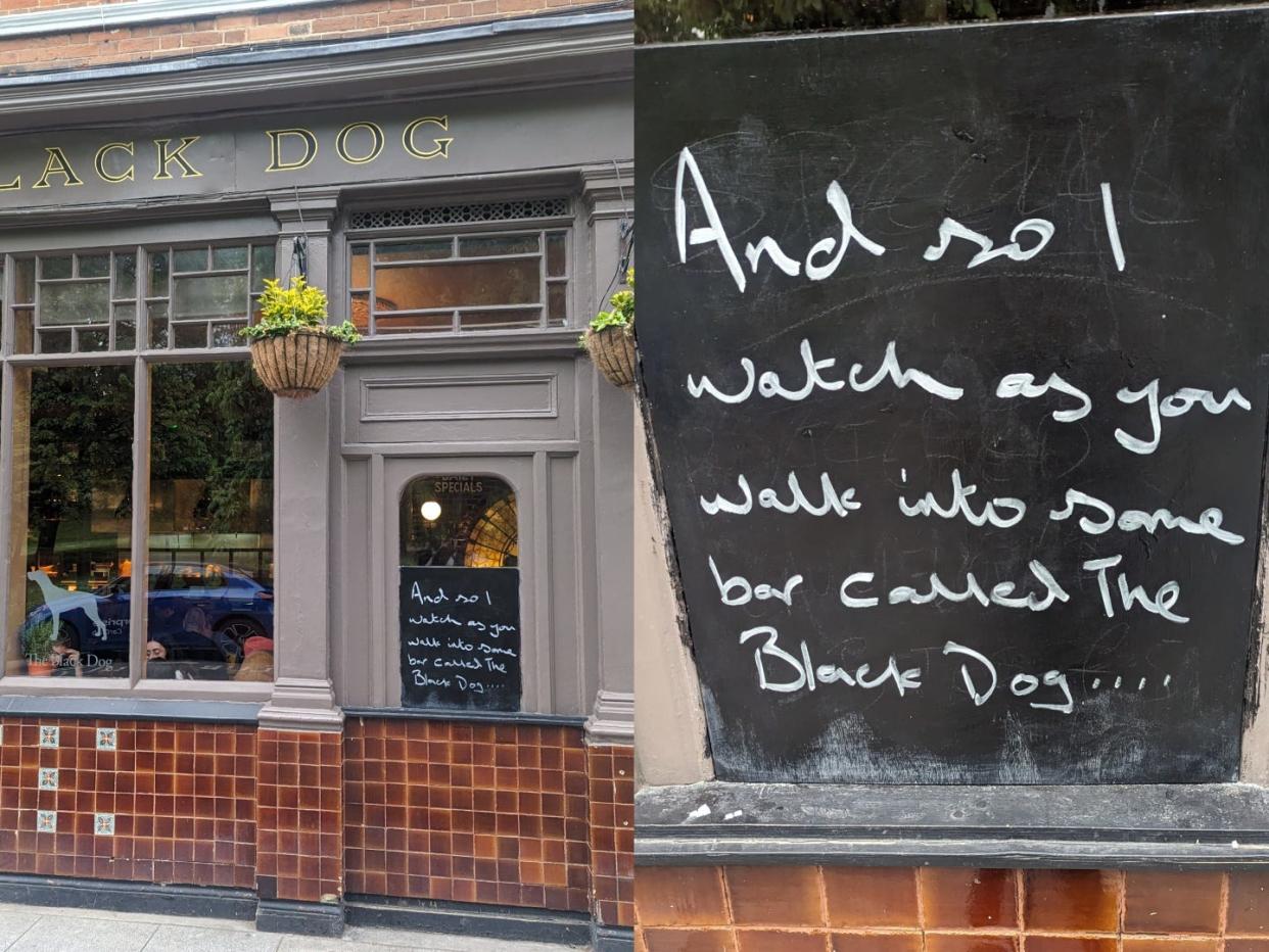 Photo of Taylor Swift's lyrics outside The Black Dog Pub.