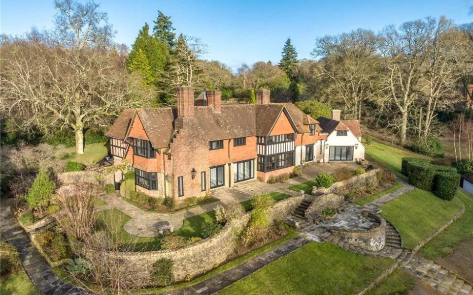 The gated 8,000sq ft home contains 10 acres of land, a man-made pond and a four-bedroom detached annexe.