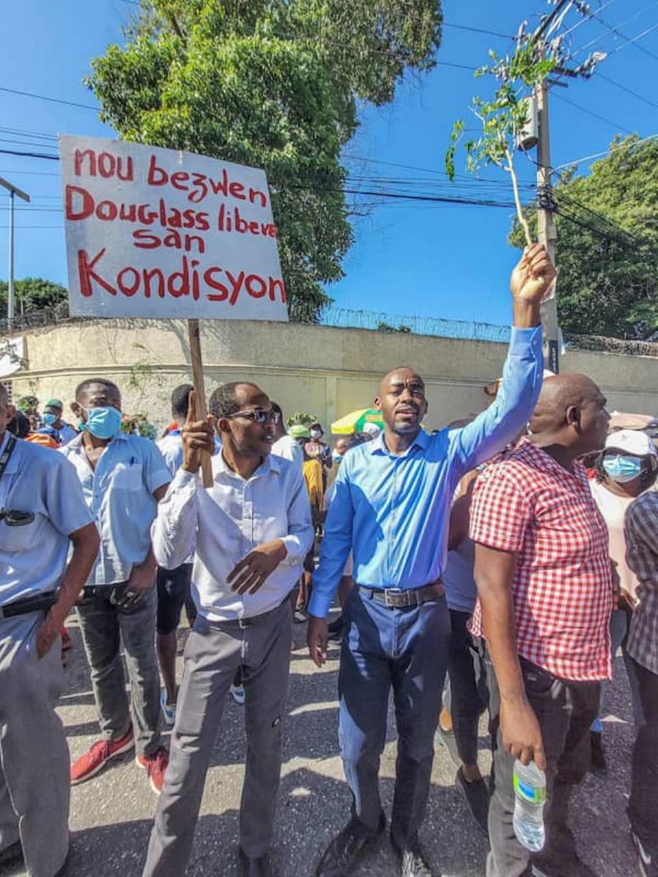 Crowds outside of the Port-au-Prince medical facility, GHESKIO, demanding the freedom of Douglas Pape, son of the Dr. Jean William “Bill” Pape, a renowned doctor. The 33-year-old agronomist was kidnapped on Nov. 28 near his coffee farm in the hills above Haiti’s capital and remains captive.