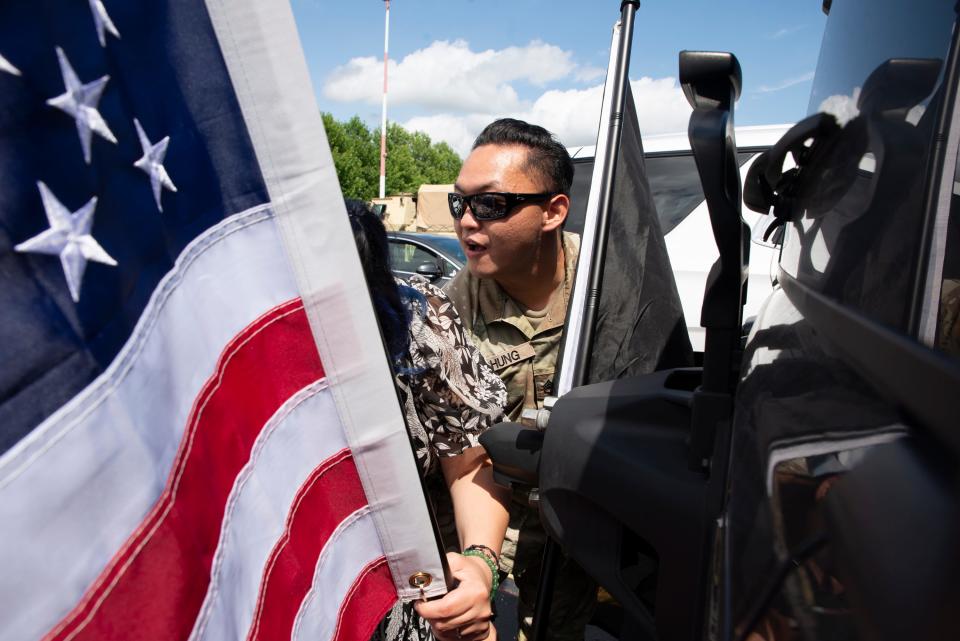 Sixty soldiers from the Indiana National Guard 76th Infantry Brigade Combat Team are welcomed from their deployment in Kosovo at Atlantic Aviation in South Bend on Thursday, July 13, 2023.