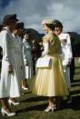 <p>Princess Margaret wearing a bright yellow dress and matching hat during her 1955 tour of the Caribbean.</p>