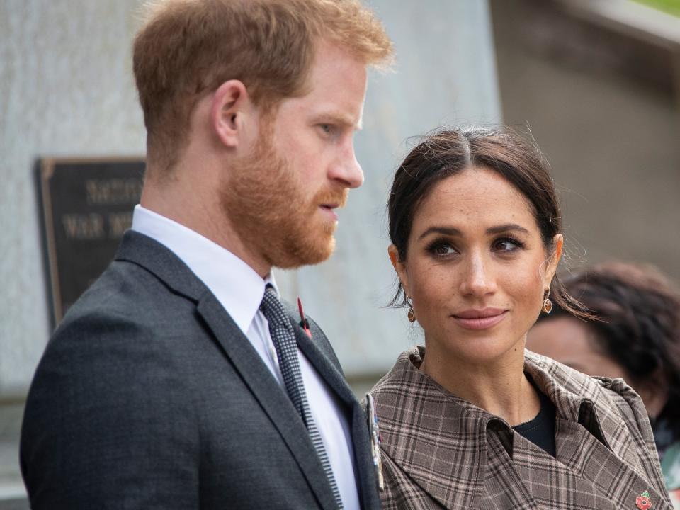 Prince Harry, Duke of Sussex and Meghan, Duchess of Sussex lay ferns and a wreath at the tomb of the Unknown Warrior at the newly unveiled UK war memorial and Pukeahu National War Memorial Park, on October 28, 2018, in Wellington, New Zealand. The Duke and Duchess of Sussex are on their official 16-day Autumn tour visiting cities in Australia, Fiji, Tonga and New Zealand.