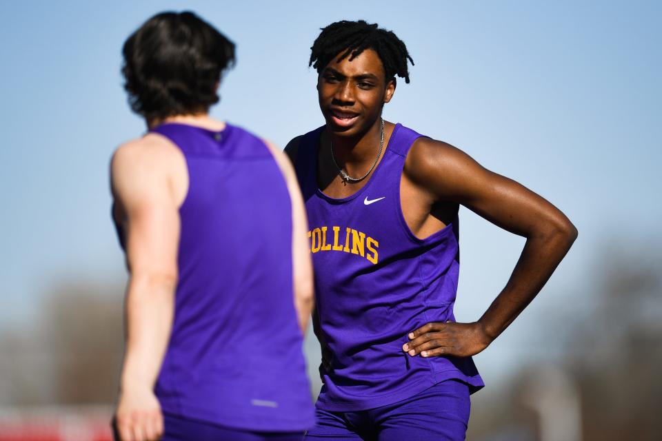 Fort Collins' Joe Cottingham shakes hands with a temmate after running the boys 100 meter dash at the Randy Yaussi City Championships at French Field on Tuesday, April 11, 2023, in Fort Collins, Colo.