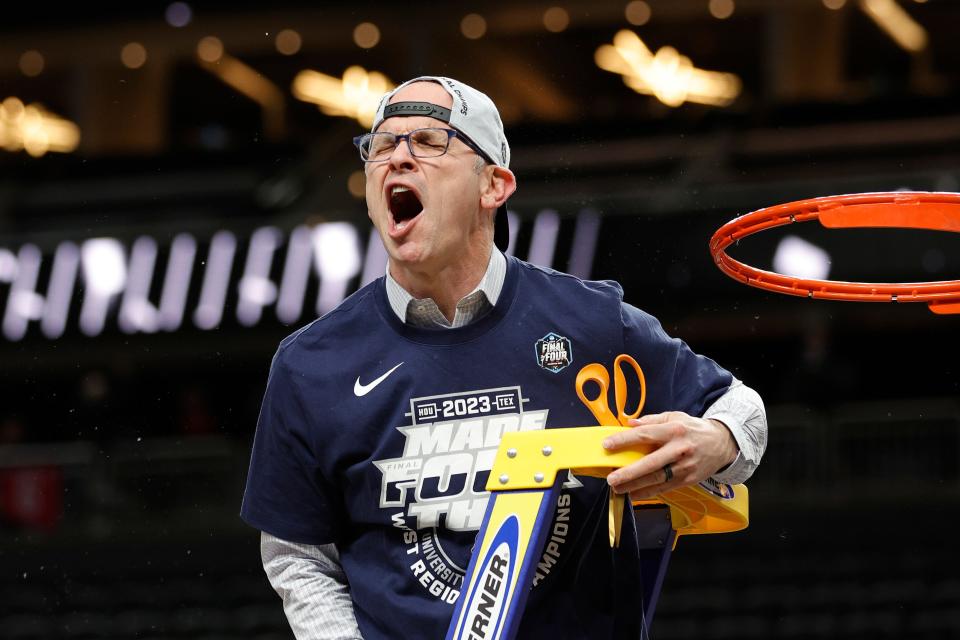 Dan Hurley celebrates after the Huskies beat Gonzaga to earn a berth in the Final Four.