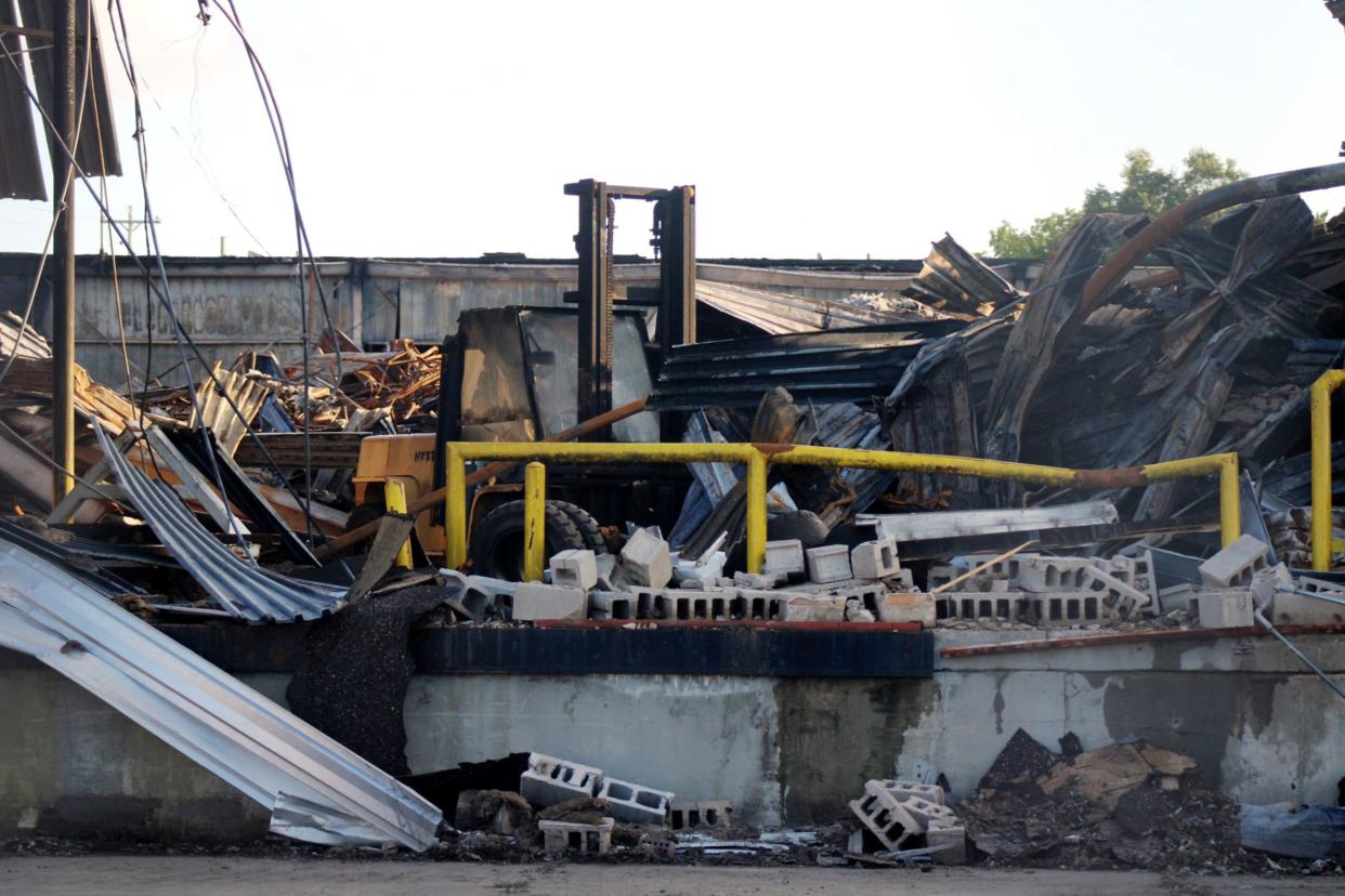The remains of a Tissue Depot storage facility are visible on Monday, Sept. 18, 2023 following a fire.