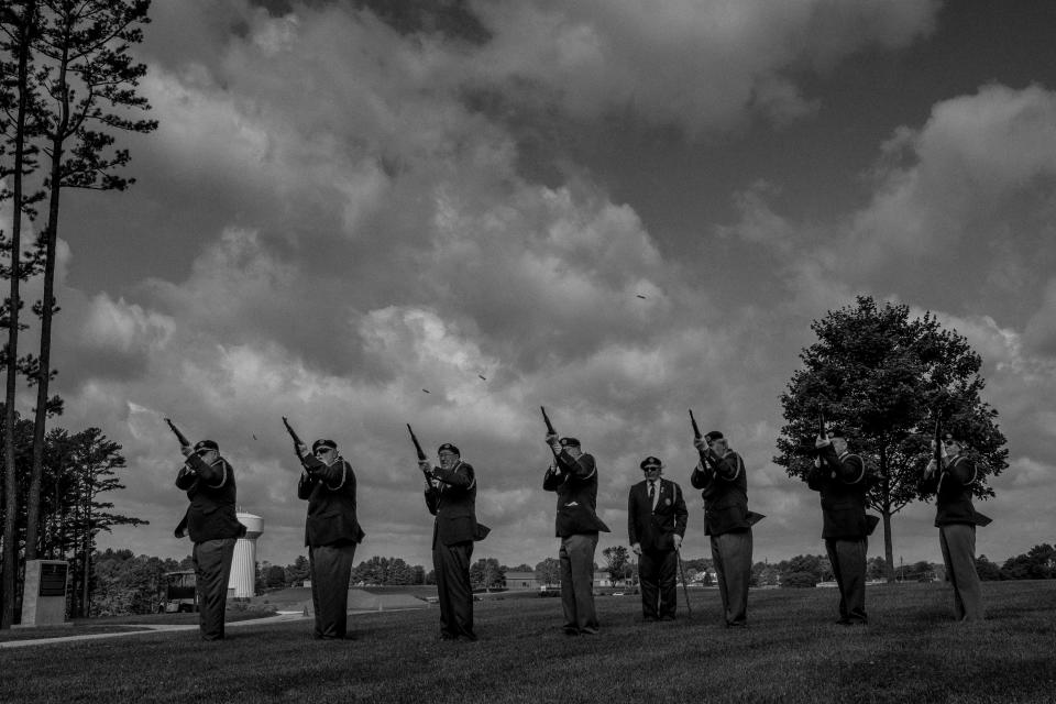 American Legion members perform a salute on Memorial Day last May at the Southwest Virginia Veterans Cemetery. The people of Radford are loyal to the U.S. military and to the jobs it provides at the Radford Army Ammunition Plant. (Photo: Ashley Gilbertson/VII Photo, special to ProPublica)